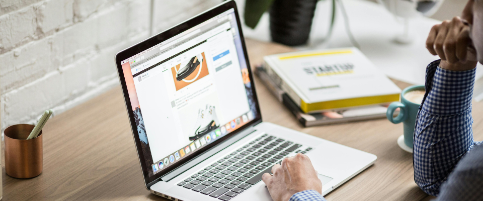 an association executive is working on a digital content