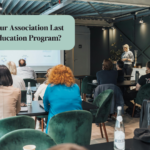 Association professionals attending a professional development workshop, with a presenter and projected screen at the front of the room.